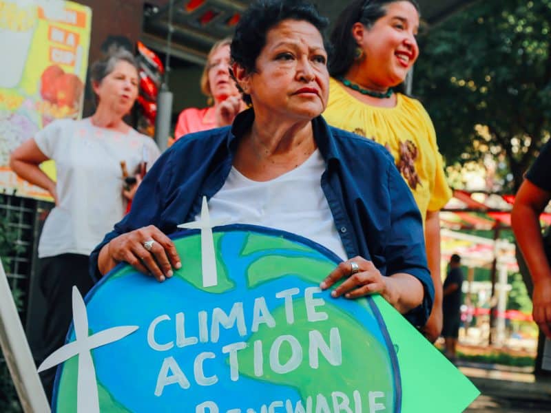 San Antonio artist Mary Agnes Rodriguez represents at historic climate justice rally last summer during the city's mayor runoff election. Image: Vanessa Ramos